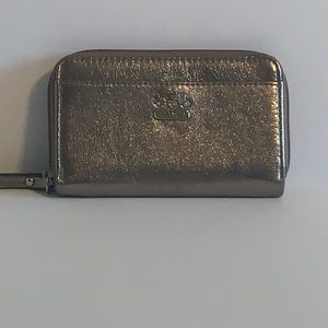 Coach Wristlet small gold tone